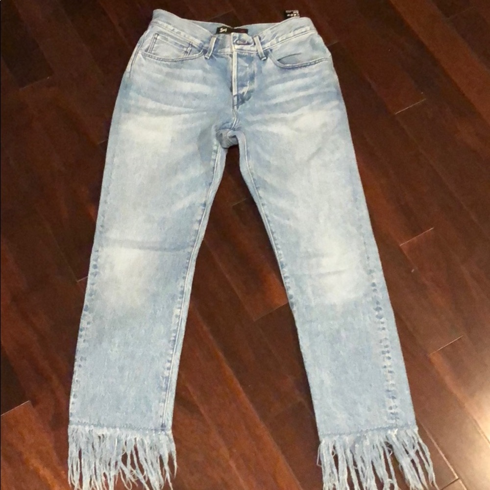 Trendy fringe jeans